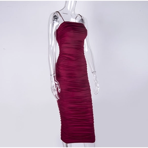 Detailed view of the ruched texture on a burgundy spaghetti strap midi dress