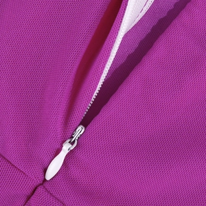 Close-up of a white invisible zipper and mesh fabric texture on a purple dress