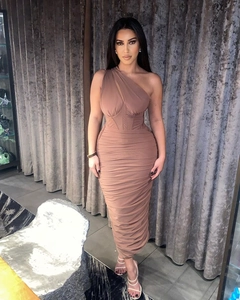 Detail of tan ruched midi dress showing off-shoulder neckline and corset-style bodice