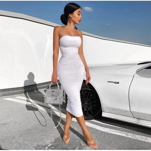 Sleeveless white ruched midi dress with spaghetti straps for elegant summer vacation style