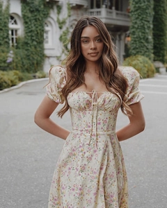 Detail of floral puff sleeves and milkmaid neckline on a summer tea break dress