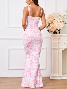 Close-up of floral backless maxi dress with delicate straps and hidden back zipper