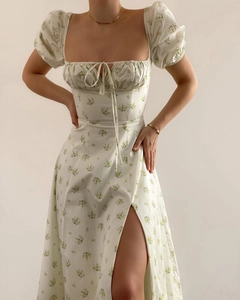 Detail of square neck floral dress with puff sleeves and drawstring bust tie