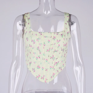 Close-up of floral corset top with fishbone structure and square neck design