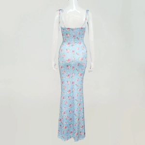 Detail view of floral backless maxi dress with thin straps and hidden zipper closure