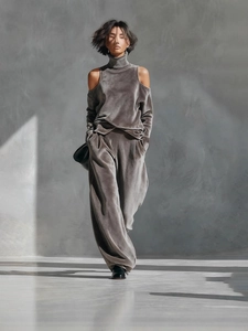 Women's grey velvet two-piece set featuring high neck cold shoulder top and wide leg pants