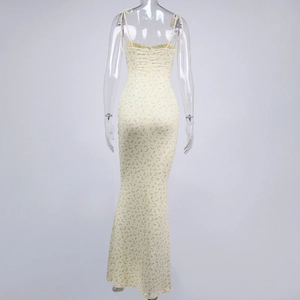 Detailed back view of floral fishtail dress with thin straps and invisible zipper
