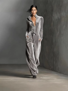 Chic grey velvet long sleeve jumpsuit with zipper front and drawstring waist design