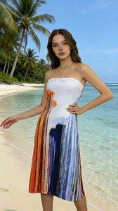 Detail of a strapless summer dress featuring bold abstract prints and a side slit design
