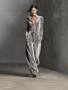 Chic grey velvet long sleeve jumpsuit with high neck zipper and drawstring waist detail