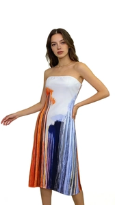 Detailed front view of strapless maxi dress featuring vibrant abstract oil painting print