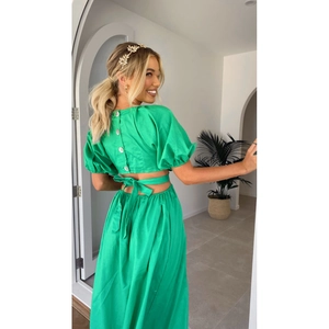 Green two-piece summer set with puff sleeve crop top and long skirt in cotton linen