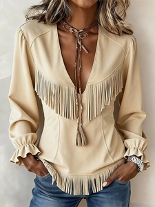 Women's V-neck cream faux suede top featuring bohemian fringe and ruffled long sleeves
