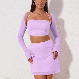 Three-piece lavender mesh set with halter top, sheer shrug, and mini skirt for women