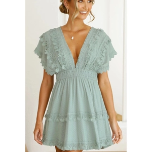 Mini robe sexy à col en V vert menthe à pois suisses avec pompons en dentelle