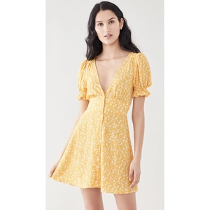 Bright yellow floral mini dress with V-neck, puff sleeves and button-down front detailing