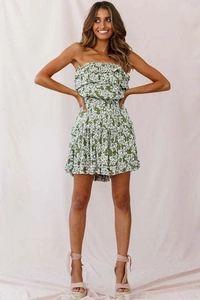 Detail of dark green floral off-shoulder mini dress with ruffles and cinched waistline