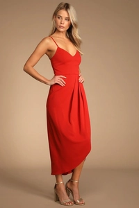 Detailed view of red V-neck spaghetti strap dress with elegant draped pleats and fluid fabric