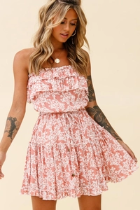 Detail of floral off-shoulder mini dress featuring ruffled layers and drawstring waist