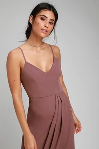Detail of V-neck sleeveless slip dress in dusty pink featuring elegant waist pleats