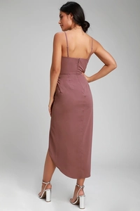 Detail view of the sleek back zipper and side slit on this dusty pink slip dress