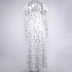 Close-up of the hidden back zipper and floral puff sleeves on the white long dress