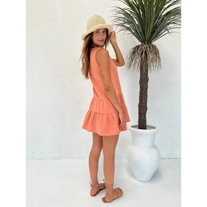 Elegant coral orange sleeveless tiered mini dress with double ruffle hem and casual summer style
