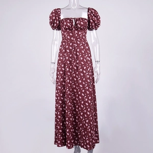 Close-up of wine red floral dress with puffy sleeves and adjustable drawstring neckline