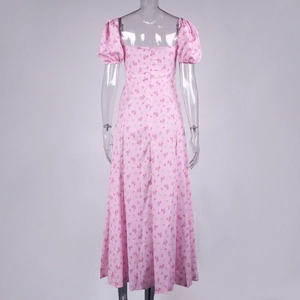 Detailed back view of a pink floral midi dress with puff sleeves and invisible zipper