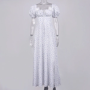Detail of square neckline with lace-up tie and puff sleeves on white floral maxi dress