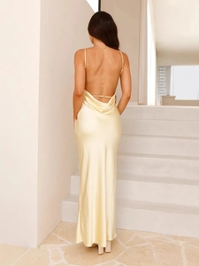 Elegant champagne satin maxi dress with a cowl back and fishtail hem for evening galas