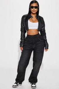 Detail shot of a black PU leather biker jacket featuring a stand collar and metal zipper