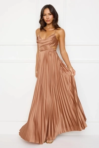 Detail of elegant pleated long dress with bronze satin fabric and side cutout design