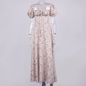 Detail of puff sleeves and ruched bust on a French vintage floral midi dress