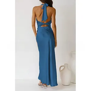 Detail view of a blue satin halter dress with an elegant back twist and bow tie design