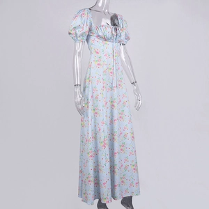 Detailed view of floral print pattern and drawstring bust on light blue summer dress
