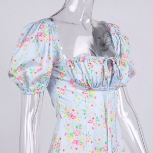 Detail of square neckline with drawstring and puff sleeves on floral midi dress