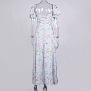 Detail of invisible back zipper on a light blue floral puff sleeve square neck dress