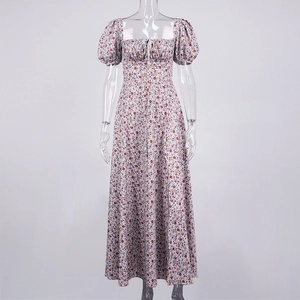 Detailed view of the square neck with drawstring pleated chest and red floral print