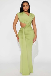 Detail view of lime green slim dress with side cut-out and elegant ruched texture