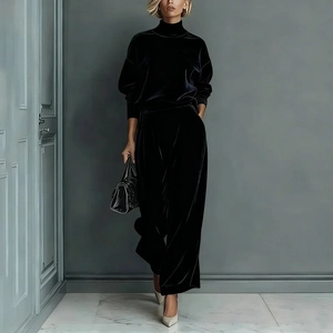 Chic black velvet tracksuit set with high-neck zipper top and wide-leg trousers