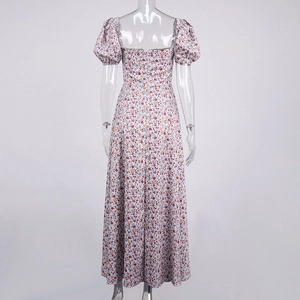 Detail of floral print maxi dress featuring bubble sleeves and back zipper closure