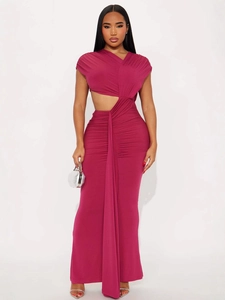 Elegant magenta sleeveless one-shoulder dress with side cutout and draped fishtail hem