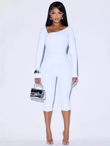 Women's chic white slim fit two-piece set with asymmetrical neck top and capri leggings