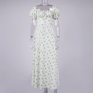 Detail of floral printed French dress with bubble sleeves and a drawstring neckline