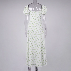 Back view of a white floral maxi dress featuring a square neck and puff sleeves
