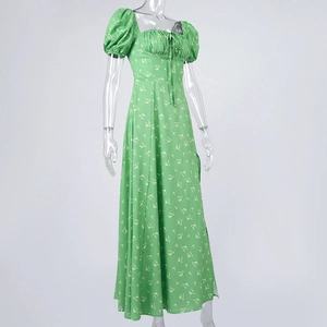 Detail of square neckline with drawstring and puff sleeves on green floral dress