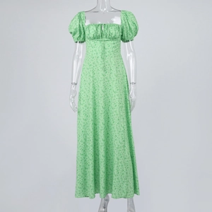 Detailed front view of light green floral dress with square neck and puff sleeves