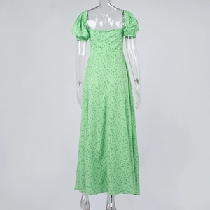 Close-up detail of the hidden back zipper on this green floral print A-line maxi dress