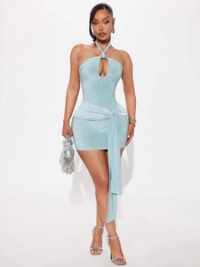 Sexy light blue halter mini dress with cutout chest and side sash detail on a model